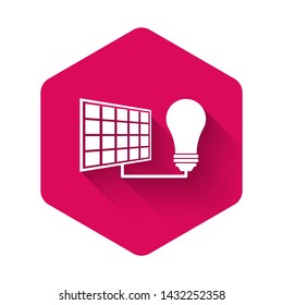 White Solar energy panel and light bulb icon isolated with long shadow. Pink hexagon button. Vector Illustration