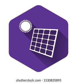 White Solar energy panel and sun icon isolated with long shadow. Purple hexagon button. Vector Illustration