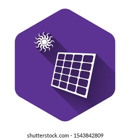 White Solar energy panel and sun icon isolated with long shadow. Purple hexagon button. Vector Illustration