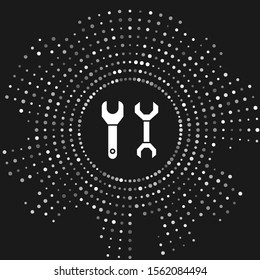 White Spanner icon isolated on grey background. Abstract circle random dots. Vector Illustration
