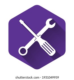 White Spanner and screwdriver tools icon isolated with long shadow. Service tool symbol. Purple hexagon button. Vector Illustration