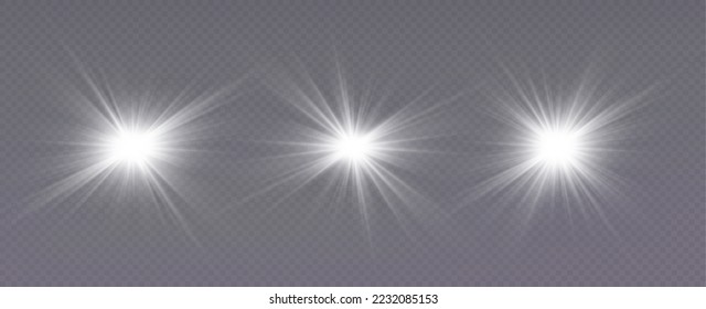 White sparkles.Bright star.Glow burst.Rays of the sun on a transparent background.
