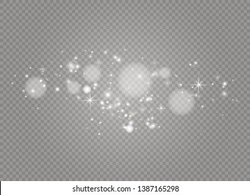 White sparks and golden stars sparkle with a special light effect. Sparkling particles of fairy dust.Vector glitters on a transparent background. Christmas abstract pattern