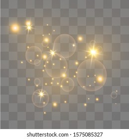 White sparks and golden stars sparkle with a special light effect. Sparkling particles of fairy dust.Vector glitters on a transparent background. Christmas abstract pattern