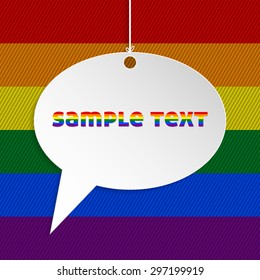 White speech bubble with text and gay flag background