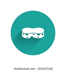 White Sponge icon isolated with long shadow. Wisp of bast for washing dishes. Cleaning service concept. Green circle button. Vector Illustration