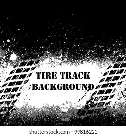 White spray paint blots and tire track silhouette