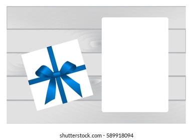 White Square Gift Box with Blue Bow and White Sheet of paper Isolated
 on Wooden Plank Background.  Has place for your text. Vector image.