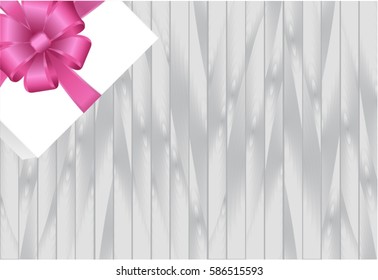 White Square Gift Box with Pink Bow on Wooden Plank Background with  place for your text. Vector image.
