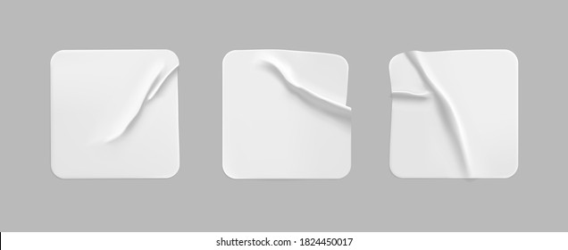 White square glued stickers mock up set. Blank white adhesive square paper or plastic sticker label with wrinkled, crumpled effect. Blank template label tags. 3d realistic vector