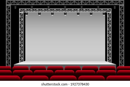 white stage with spotlight and red seats in the hall