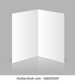 White stationery: blank twofold paper brochure on gray background. 