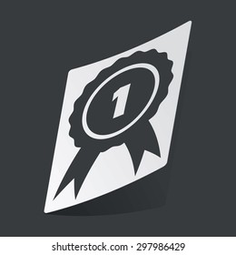 White sticker with black image of first place award, on black background