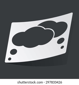White sticker with black image of two thought bubbles, on black background