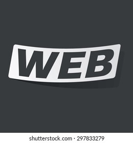 White sticker with black text WEB, on black background