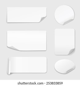 White Stickers - Set of white paper stickers isolated on white background.  Round, rectangular. Vector illustration