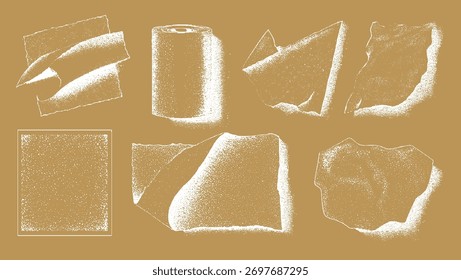 Texturas de papel punteado blanco y un rollo sobre un fondo marrón.