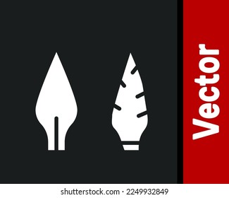 White Stone age arrow head icon isolated on black background. Medieval weapon.  Vector