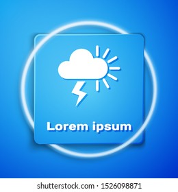 White Storm icon isolated on blue background. Cloudy with lightning and sun sign. Weather icon of storm. Blue square button. Vector Illustration
