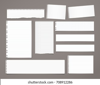 White striped note paper, copybook, notebook sheet stuck on dark brown background.