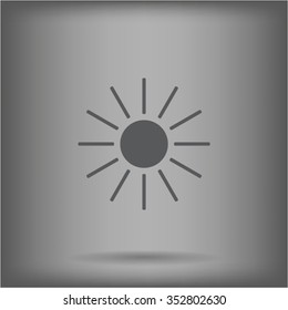 white sun icon on gray background