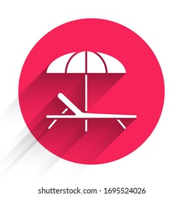 White Sunbed icon isolated with long shadow. Beach umbrella and Sun lounger. Red circle button. Vector Illustration
