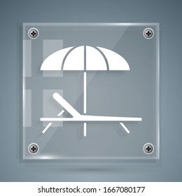 White Sunbed icon isolated on grey background. Beach umbrella and Sun lounger. Square glass panels. Vector Illustration