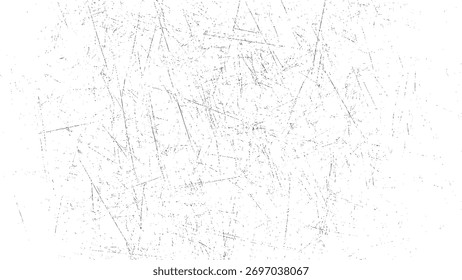 A white surface covered in a dense pattern of thin grey scratches and small dots creating a distressed texture.