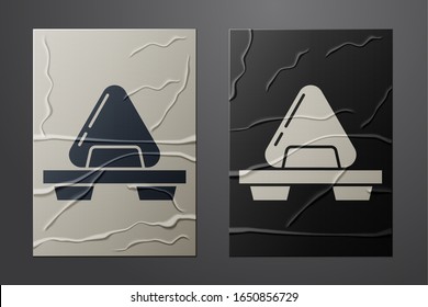 White Sushi on cutting board icon isolated on crumpled paper background. Asian food sushi on wooden board. Paper art style. Vector Illustration