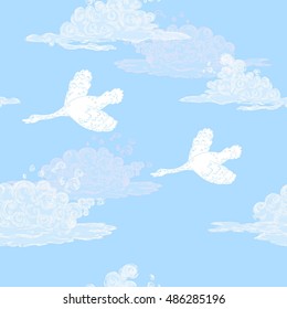 White swan in blue  sky