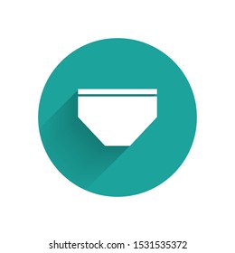 White Swimming trunks icon isolated with long shadow. Green circle button. Vector Illustration
