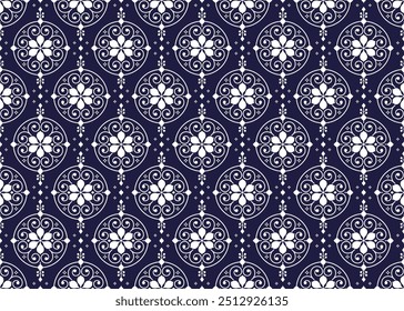 White symbol floral on dark blue background, ethnic fabric seamless pattern, design for cloth, carpet, batik, wallpaper, wrapping etc.