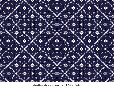 Símbolo blanco floral sobre fondo azul oscuro, patrón transparente de tela étnica, diseño para tela, alfombra, batik, Fondo de pantalla, envoltura, etc.