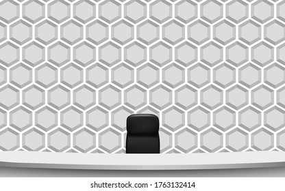 white table and chair with white hexagon background in the news studio room