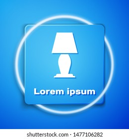 White Table lamp icon isolated on blue background. Blue square button. Vector Illustration