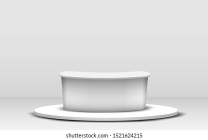 white table on white stand in the white room