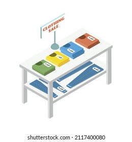 White table with tshirts and jeans on sale at flea market isometric icon 3d vector illustration