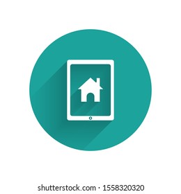 White Tablet and smart home icon isolated with long shadow. Remote control. Green circle button. Vector Illustration