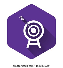 White Target with arrow icon isolated with long shadow. Dart board sign. Archery board icon. Dartboard sign. Business goal concept. Purple hexagon button. Vector Illustration