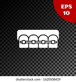 White Teeth with braces icon isolated on transparent dark background. Alignment of bite of teeth, dental row with with braces. Dental concept.  Vector Illustration