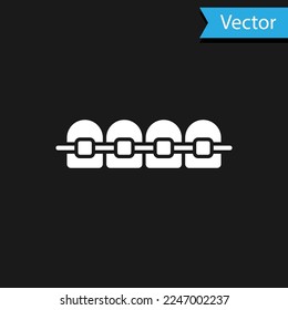 White Teeth with braces icon isolated on black background. Alignment of bite of teeth, dental row with with braces. Dental concept.  Vector