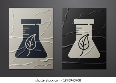 White Test tube and flask chemical laboratory test icon isolated on crumpled paper background. Laboratory glassware sign. Paper art style. Vector