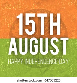 White Text 15th August on Ashoka Wheel, Indian Flag colors background for Independence Day celebration.