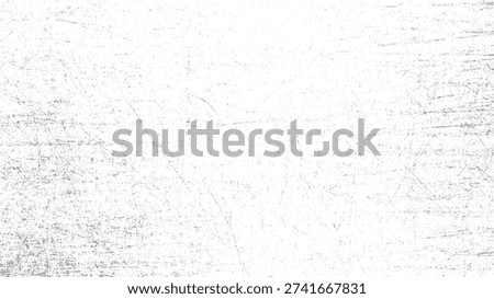 White textured background with subtle grey scratches and speckles