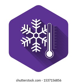White Thermometer with snowflake icon isolated with long shadow. Purple hexagon button. Vector Illustration