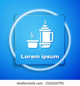White Thermos container icon isolated on blue background. Thermo flask icon. Camping and hiking equipment. Blue square button. Vector Illustration