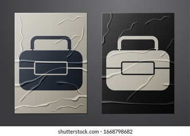 White Toolbox icon isolated on crumpled paper background. Tool box sign. Paper art style. Vector Illustration