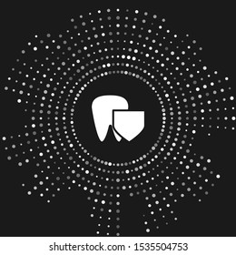 White Tooth with shield icon isolated on grey background. Dental insurance. Security, safety, protection, protect concept. Abstract circle random dots. Vector Illustration