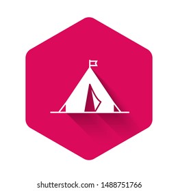 White Tourist tent with flag icon isolated with long shadow. Camping symbol. Pink hexagon button. Vector Illustration