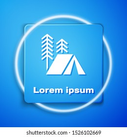 White Tourist tent icon isolated on blue background. Camping symbol. Blue square button. Vector Illustration